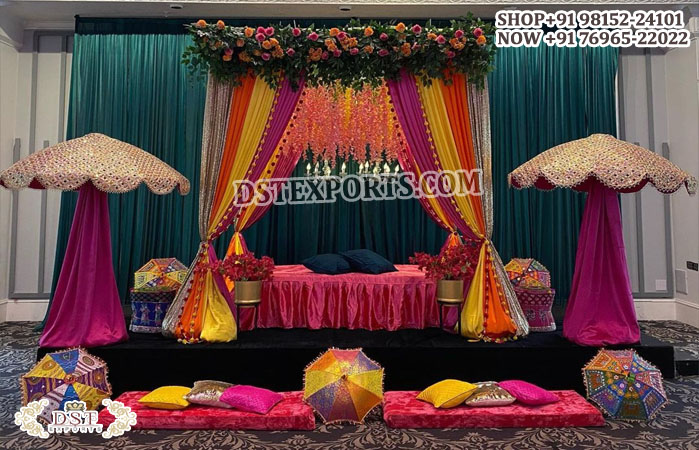 Vibrant Embroidered Umbrellas On Teej Decoration